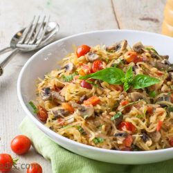 Tomato basil spaghetti squash pasta in a white bowl