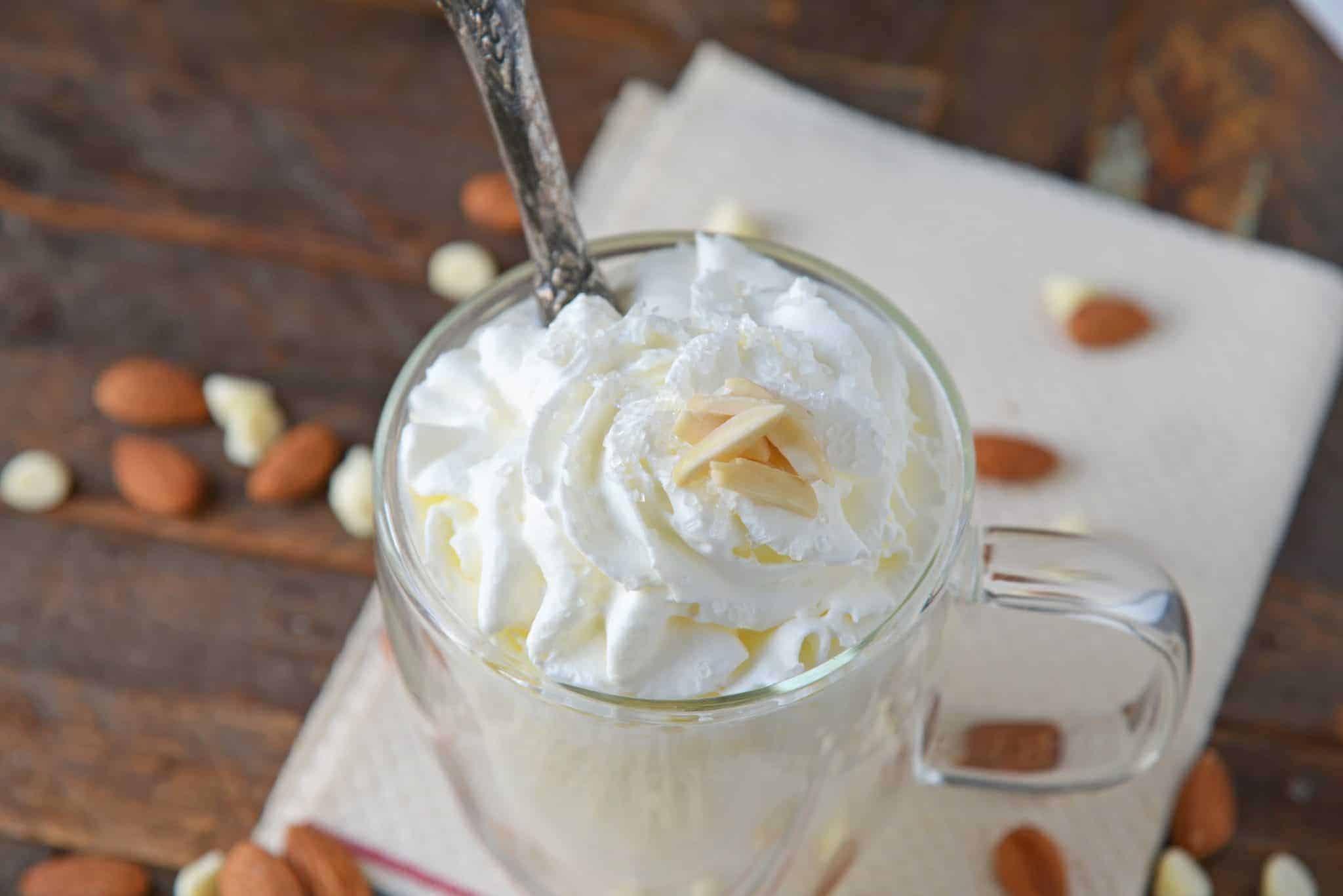 Almond Hot Chocolate is one of the most delicious white hot chocolate recipes to enjoy on a chilly night. Perfect for serving guests at parties too! #almondhotchocolate #whitehotchocolaterecipes www.savoryexperiments.com