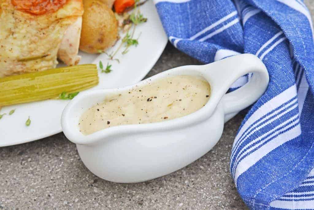 Easy Chicken Gravy made with chicken drippings is the best homemade chicken gravy recipe! It only takes 10 minutes and ingredients you already have in your pantry. #chickengravyrecipe #homemadechickengravy www.savoryexperiments.com