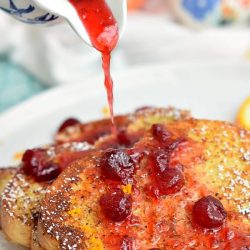 Syrup poured on cranberry orange french toast