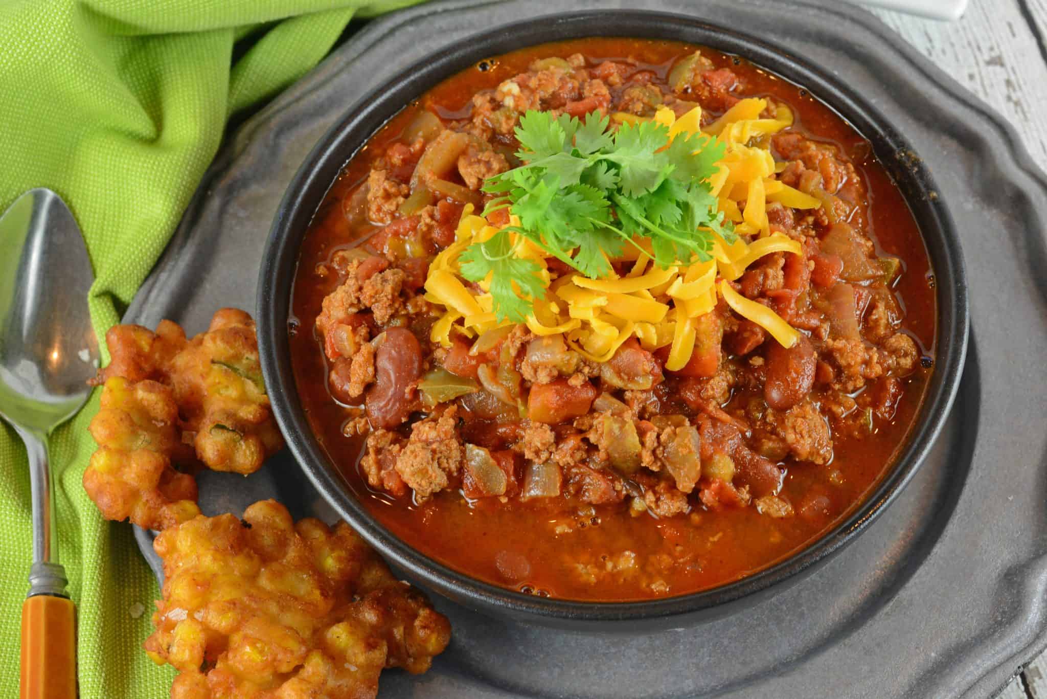 Easy Chili in a gray bowl topped with cheese