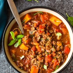 Italian Instant Pot chili in a pot with a ladle