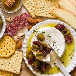 overhead shot of olive baked brie