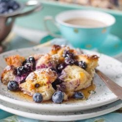 Blueberry french toast casserole on two white plates