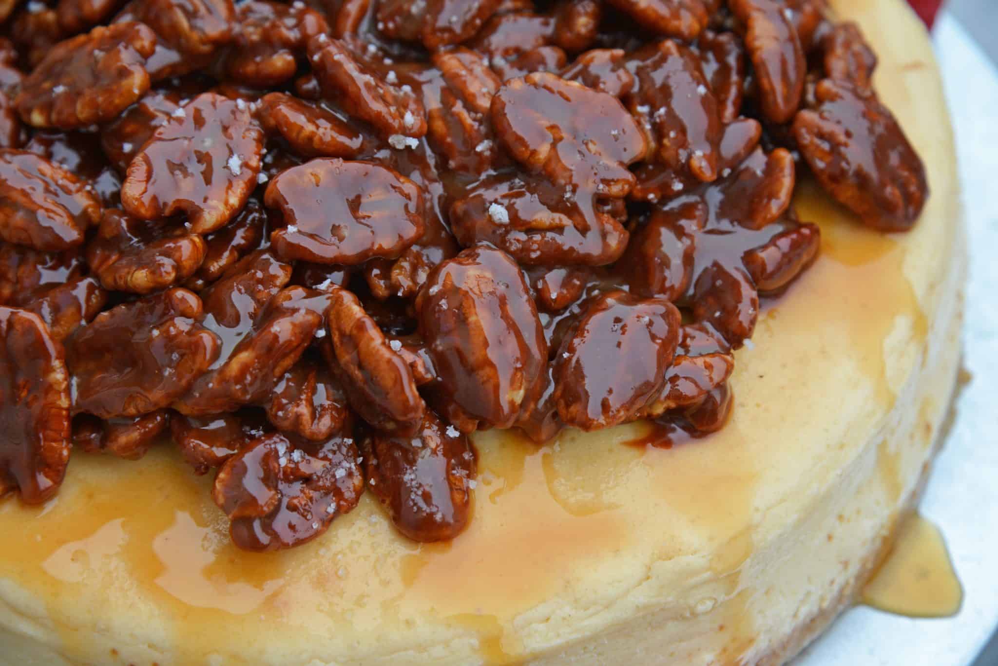 Pecan Pie Cheesecake is the perfect combination of two classic desserts - chocolate pecan pie and cheesecake. You'll want this on your holiday dessert menu! #chocolatepecanpie #pecanpiecheesecake #bestcheesecakerecipe www.savoryexperiments.com