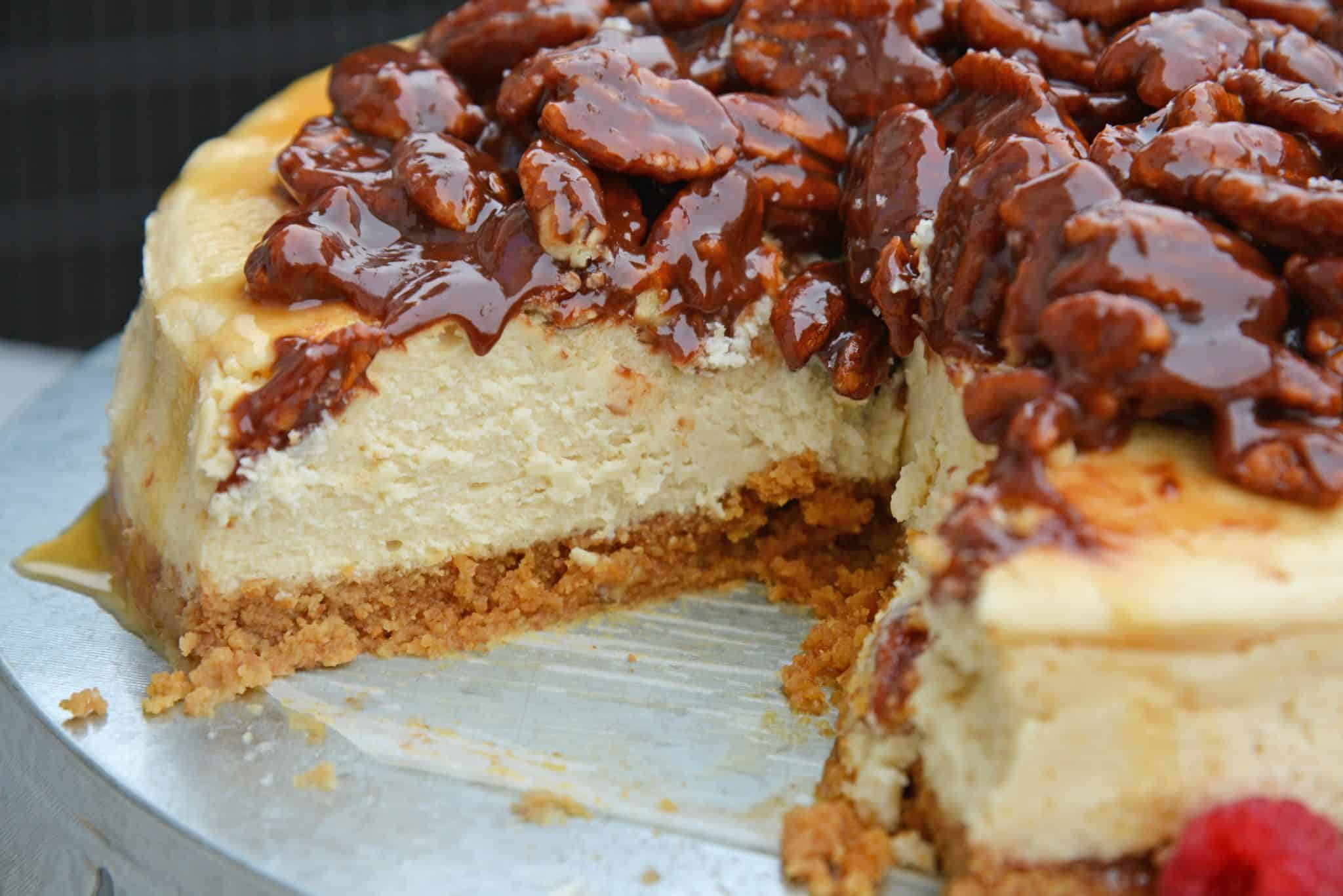 Pecan Pie Cheesecake is the perfect combination of two classic desserts - chocolate pecan pie and cheesecake. You'll want this on your holiday dessert menu! #chocolatepecanpie #pecanpiecheesecake #bestcheesecakerecipe www.savoryexperiments.com