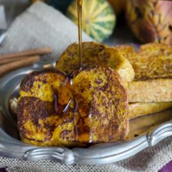 Syrup poured on slices of pumpkin french toast