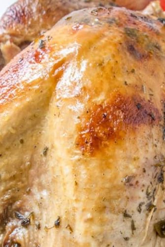 Juicy Roasted Turkey is easier than you think with my buttery recipe, a bottle of bubbles and fresh herbs. The best juicy turkey recipe ever! #juicyroastedturkey #bestturkeyrecipe #thanksgivingturkey www.savoryexperiments.com
