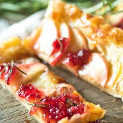 Brie puff pastry tart on a board