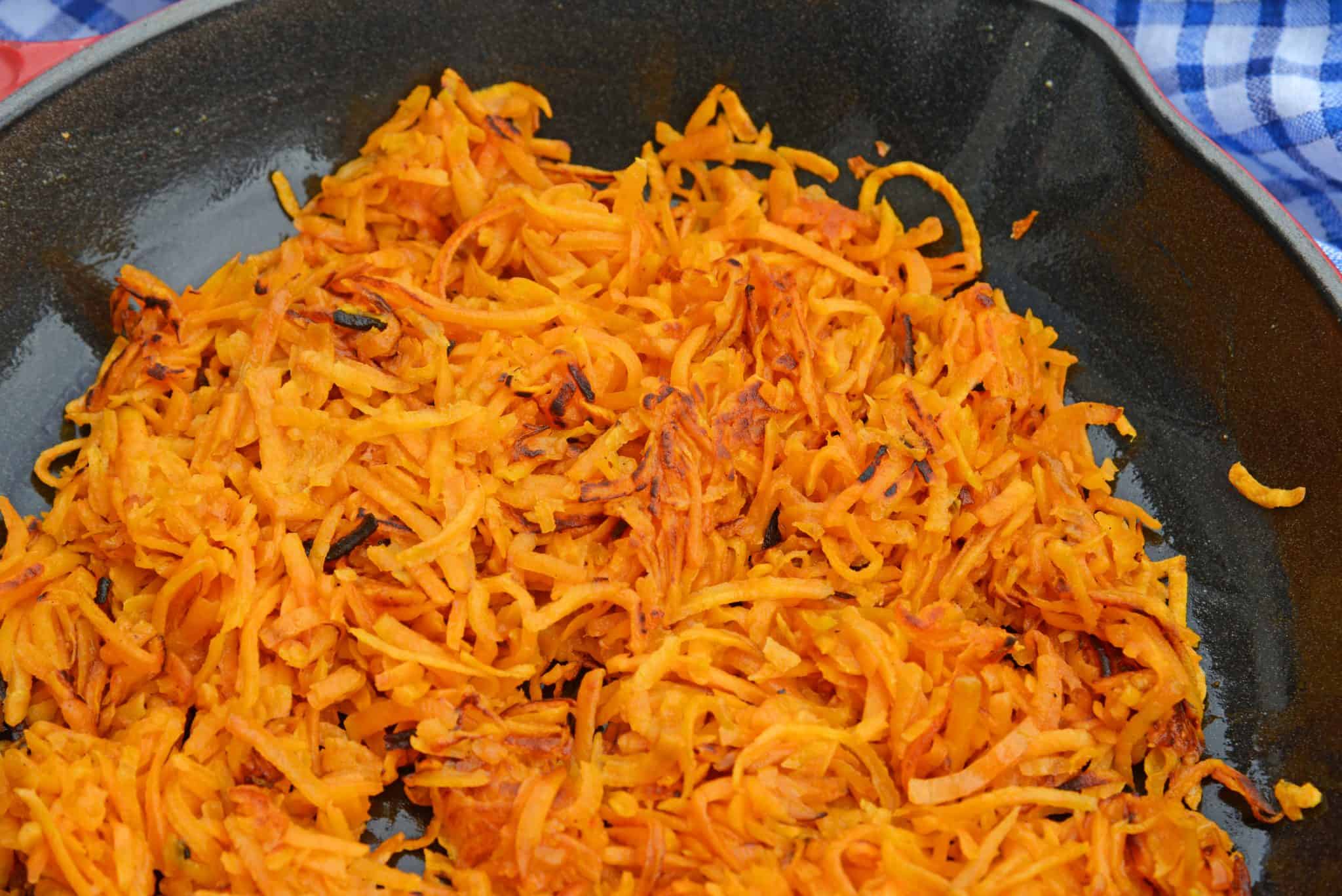 Sweet Potato Hash Browns are a simple breakfast recipe made with shredded sweet potatoes. Only 3 ingredients and a few minutes to cook! #sweetpotatohashbrowns #shreddedsweetpotatoes www.savoryexperiments.com