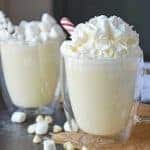 Homemade White Hot Chocolate is the perfect drink for warming up on cold days. White chocolate hot chocolate is delicious, quick and easy to make! #whitehotchocolaterecipe #whitehotcocoa www.savoryexperiments.com