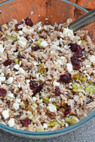 This Wild Rice Pilaf recipe is an easy side dish for your next potluck, picnic or dinner. Quick and easy to make in advance it's the best rice pilaf recipe! #wildricepilaf #ricepilafrecipe www.savoryexperiments.com