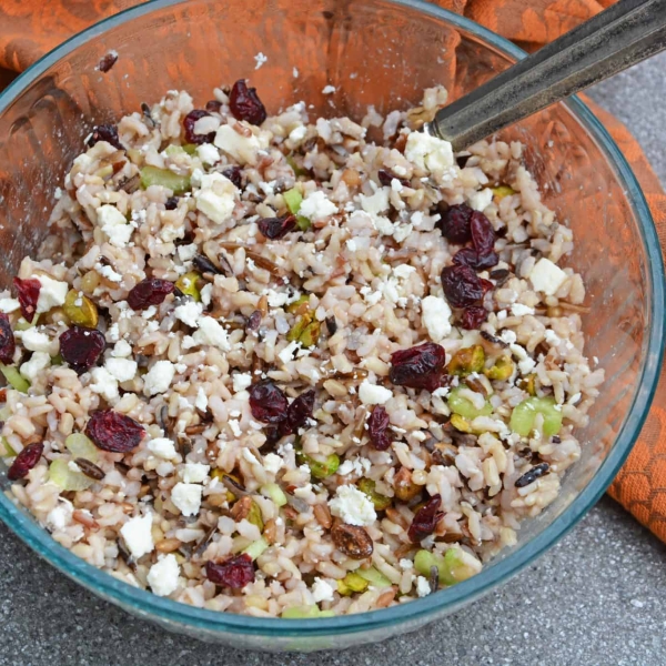 This Wild Rice Pilaf recipe is an easy side dish for your next potluck, picnic or dinner. Quick and easy to make in advance it's the best rice pilaf recipe! #wildricepilaf #ricepilafrecipe www.savoryexperiments.com
