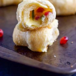 Brie stuffed crescent roll cut in half