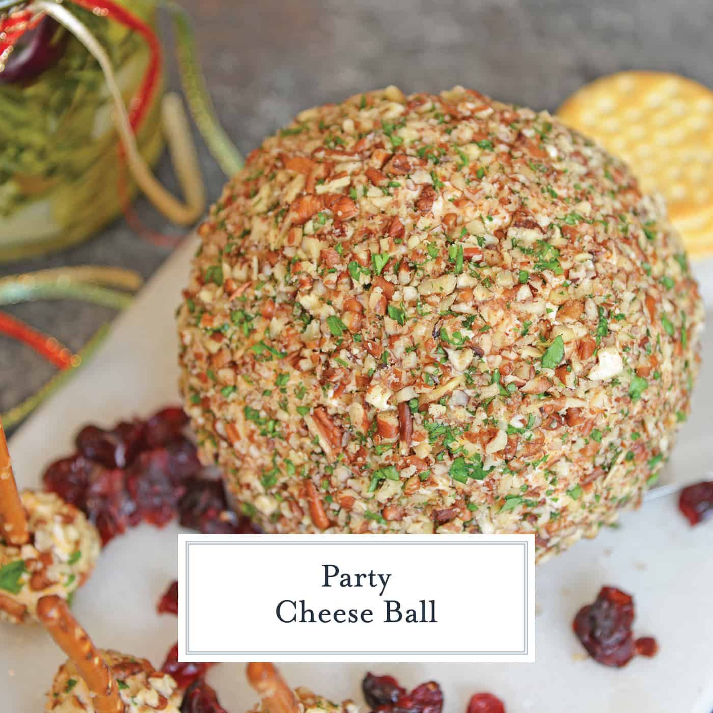 This cheese ball with cream cheese is a classic Party Cheese Ball recipe, made with simple ingredients. A must-make for any and all parties! #partycheeseballrecipe #creamcheeseball www.savoryexperiments.com