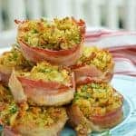 Bacon Wrapped Stuffing Muffins will become your favorite stuffing for Thanksgiving recipe. Who doesn't love stuffing with bacon?! #stuffingrecipe #stuffingforthanksgiving #stuffingmuffins www.savoryexperiments.com
