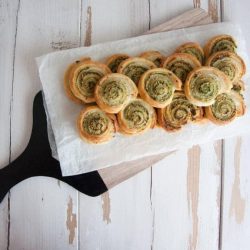 Garlic pesto pinwheel recipes on a white plate