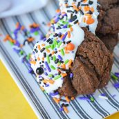 Halloween Chocolate Sugar Cookies combine soft sugar cookies with a delicious chocolate flavor, cookie icing and sprinkles for an easy Halloween dessert! #halloweencookies #chocolatesugarcookies #halloweendesserts www.savoryexperiments.com