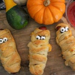 Spooky snacks for Halloween on a cutting board