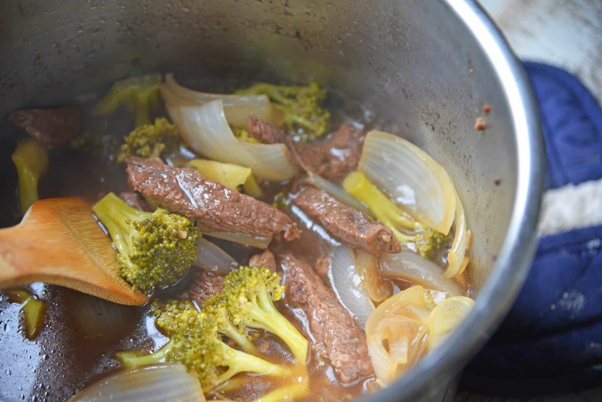 Instant Pot Beef and Broccoli is a quick, easy and healthy alternative to your favorite Chinese takeout dish. Ready in just 30 minutes! #beefandbroccoli #instantpotrecipes www.savoryexperiments.com