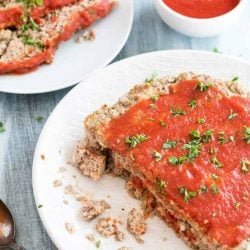Instant pot meatloaf on a white plate