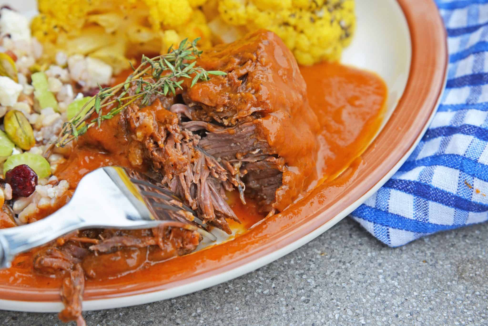 Instant Pot Short Ribs are a fast and flavorful way to make your favorite braised short ribs without all the hard work and hours of cooking. #instantpotshortribs #braisedshortribs #shortribsrecipe www.savoryexperiments.com