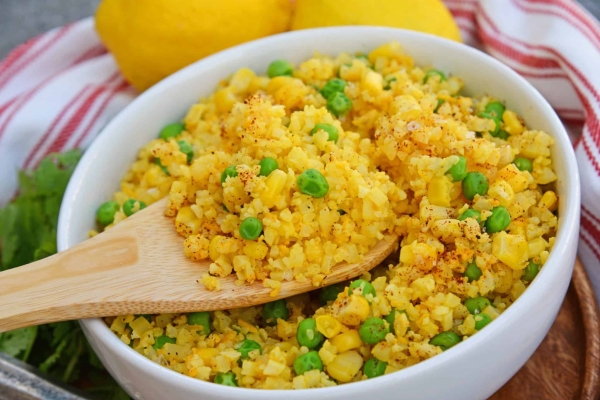 This Mexican Cauliflower Rice recipe is a deliciously easy and cheesy cauliflower rice made with simple ingredients and lots of flavor. #cheesycauliflowerrice #cauliflowerricerecipe #mexicancauliflowerrice www.savoryexperiments.com