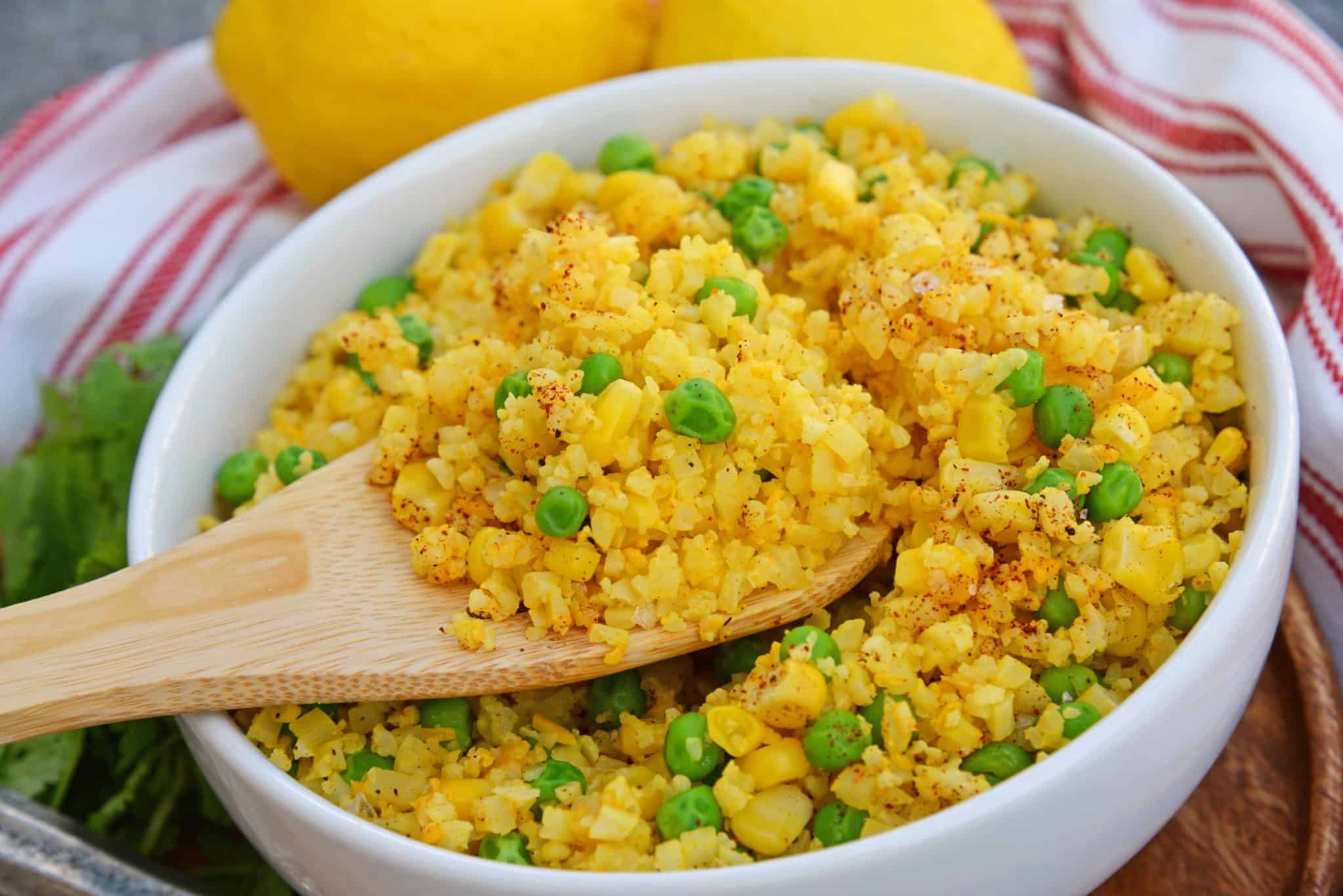 This Mexican Cauliflower Rice recipe is a deliciously easy and cheesy cauliflower rice made with simple ingredients and lots of flavor. #cheesycauliflowerrice #cauliflowerricerecipe #mexicancauliflowerrice www.savoryexperiments.com