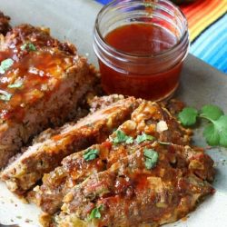 Mexican meatloaf sliced on a plate