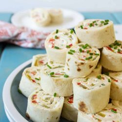 Mexican pinwheel recipes stacked on a plate