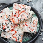 Monster Bark is a quick and easy Halloween treat made with candy eyeballs. Always a hit with kids, it's the perfect Halloween dessert for any party! #monsterbark #howtomakechocolatebark #candyeyeballs www.savoryexperiments.com