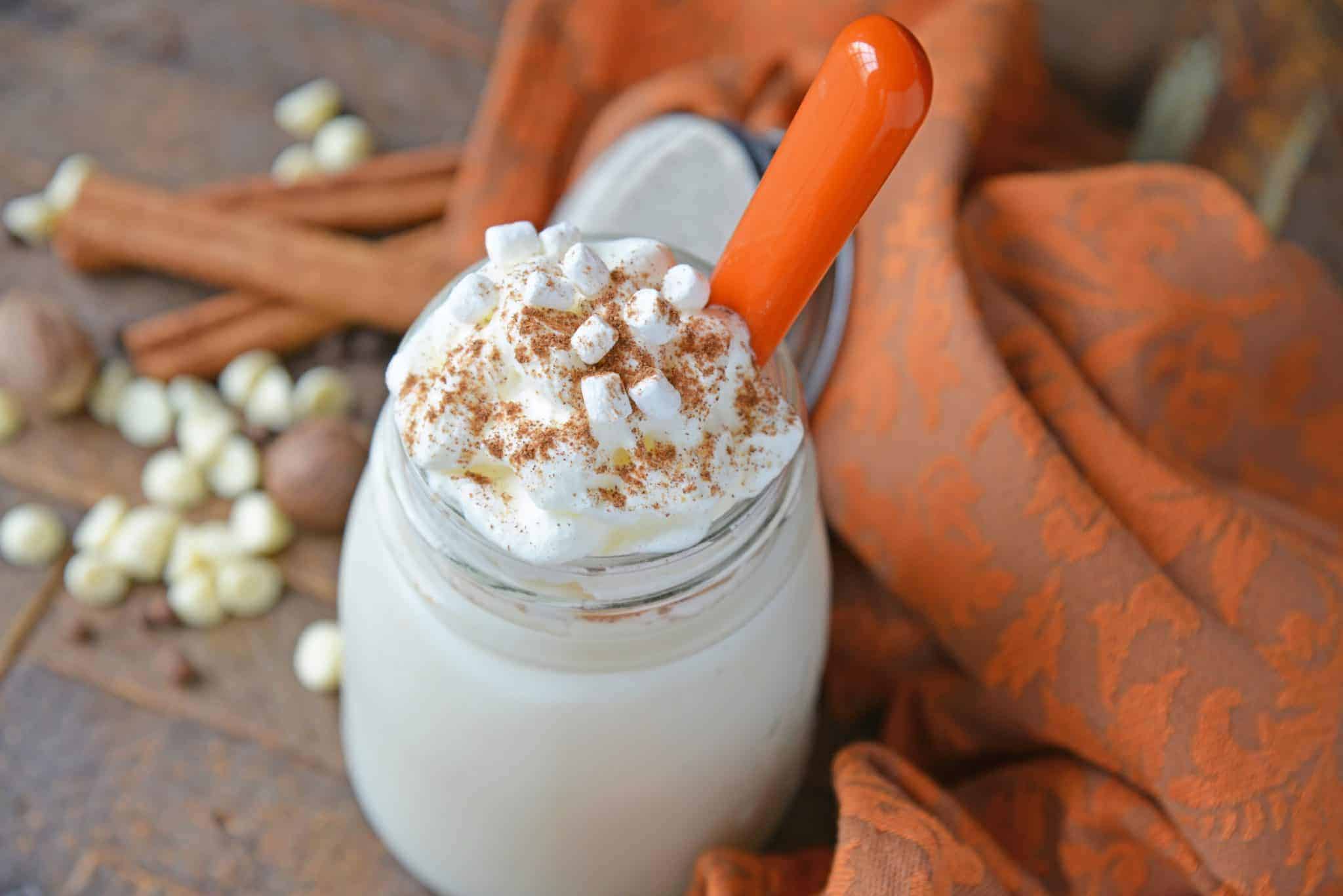 Pumpkin Spice Hot Chocolate is the perfect combination of white hot chocolate and pumpkin pie spice. The best hot chocolate recipe for fall! #pumpkinspicehotchocolate #hotchocolaterecipes #pumpkinpiespice www.savoryexperiments.com