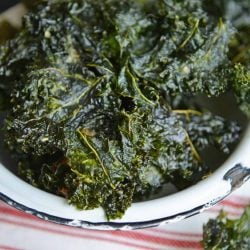 Ranch Kale Chips are a quick and easy 3 ingredient kale chips recipe that offer a tasty and healthy alternative to other chips and snacks. #ranchkalechips #kalechipsrecipe www.savoryexperiments.com