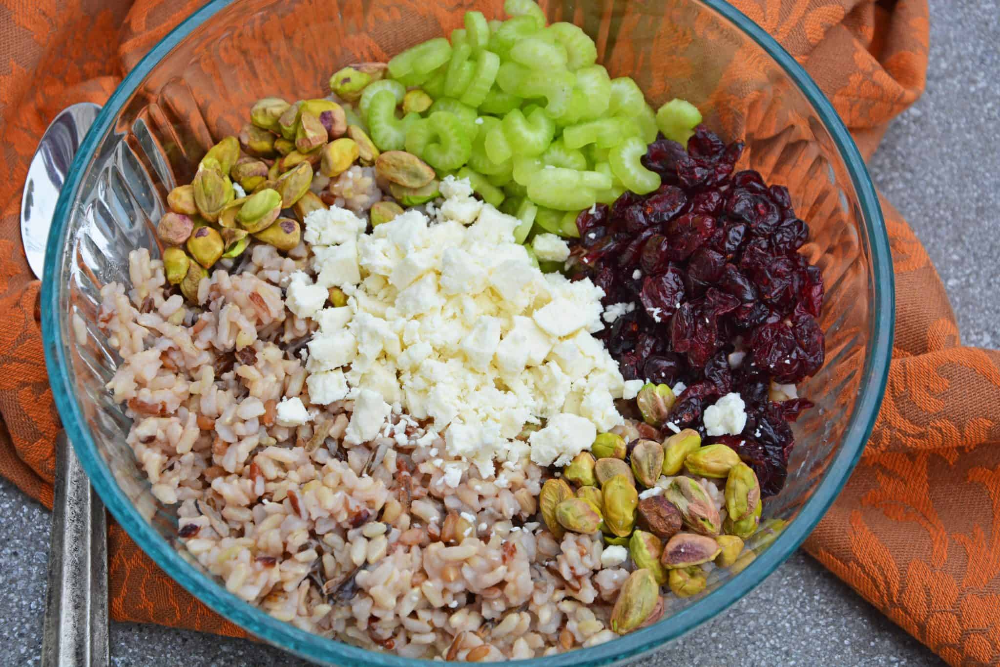 This Wild Rice Pilaf recipe is an easy side dish for your next potluck, picnic or dinner. Quick and easy to make in advance it's the best rice pilaf recipe! #wildricepilaf #ricepilafrecipe www.savoryexperiments.com