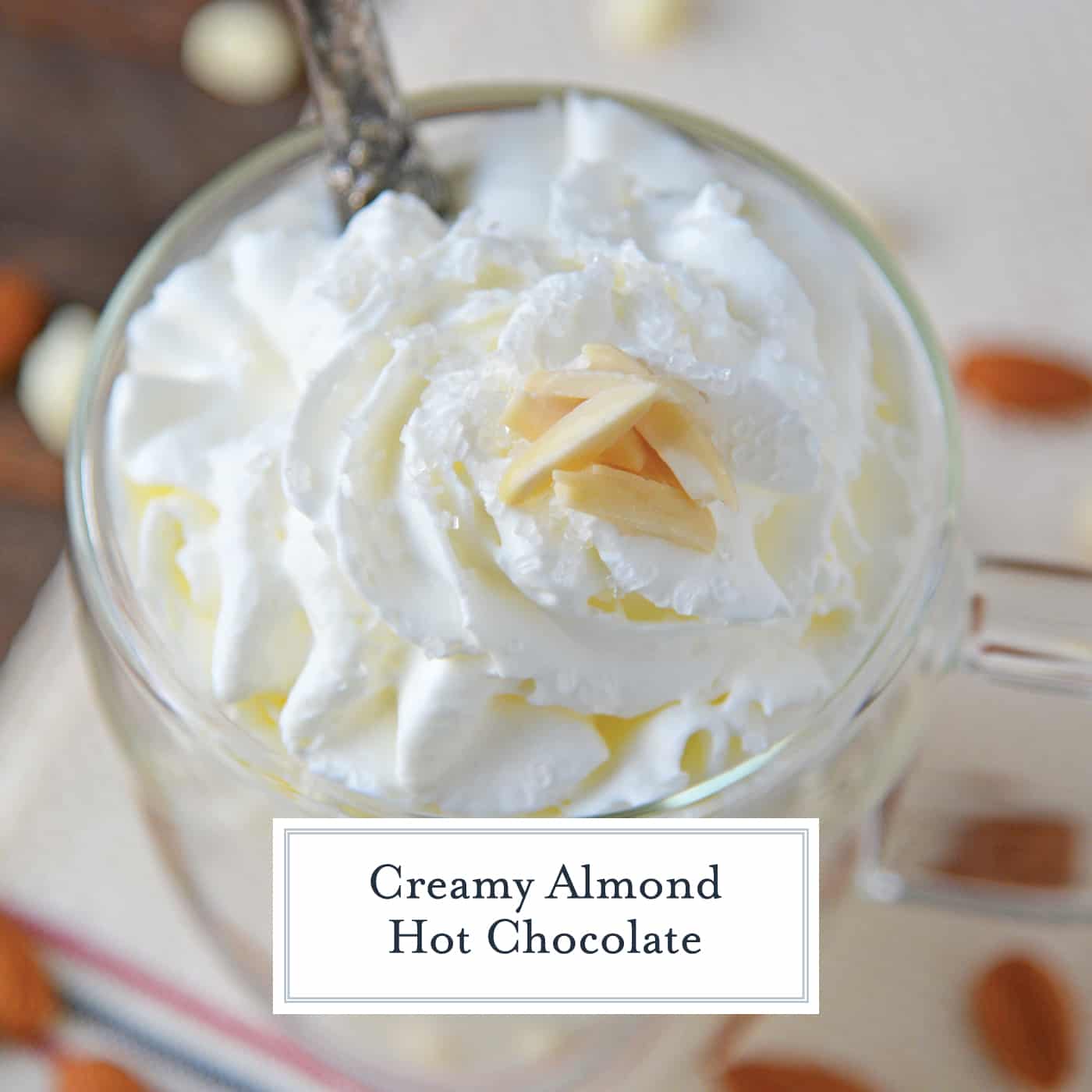Almond Hot Chocolate is one of the most delicious white hot chocolate recipes to enjoy on a chilly night. Perfect for serving guests at parties too! #almondhotchocolate #whitehotchocolaterecipes www.savoryexperiments.com