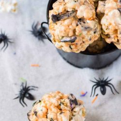 Halloween popcorn balls in a black bowl