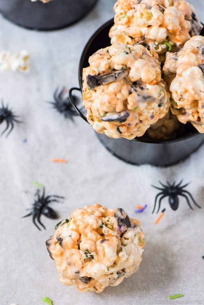 Halloween popcorn balls in a black bowl