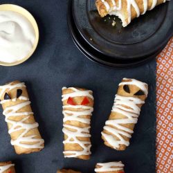 Cute Snacks for Halloween as pizza roll up mummies