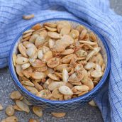 Ranch Pumpkin Seeds take roasted pumpkin seeds to a whole new level. With only 3 ingredients, they're an easy and delicious fall snack! #roastedpumpkinseeds #ranchpumpkinseeds www.savoryexperiments.com
