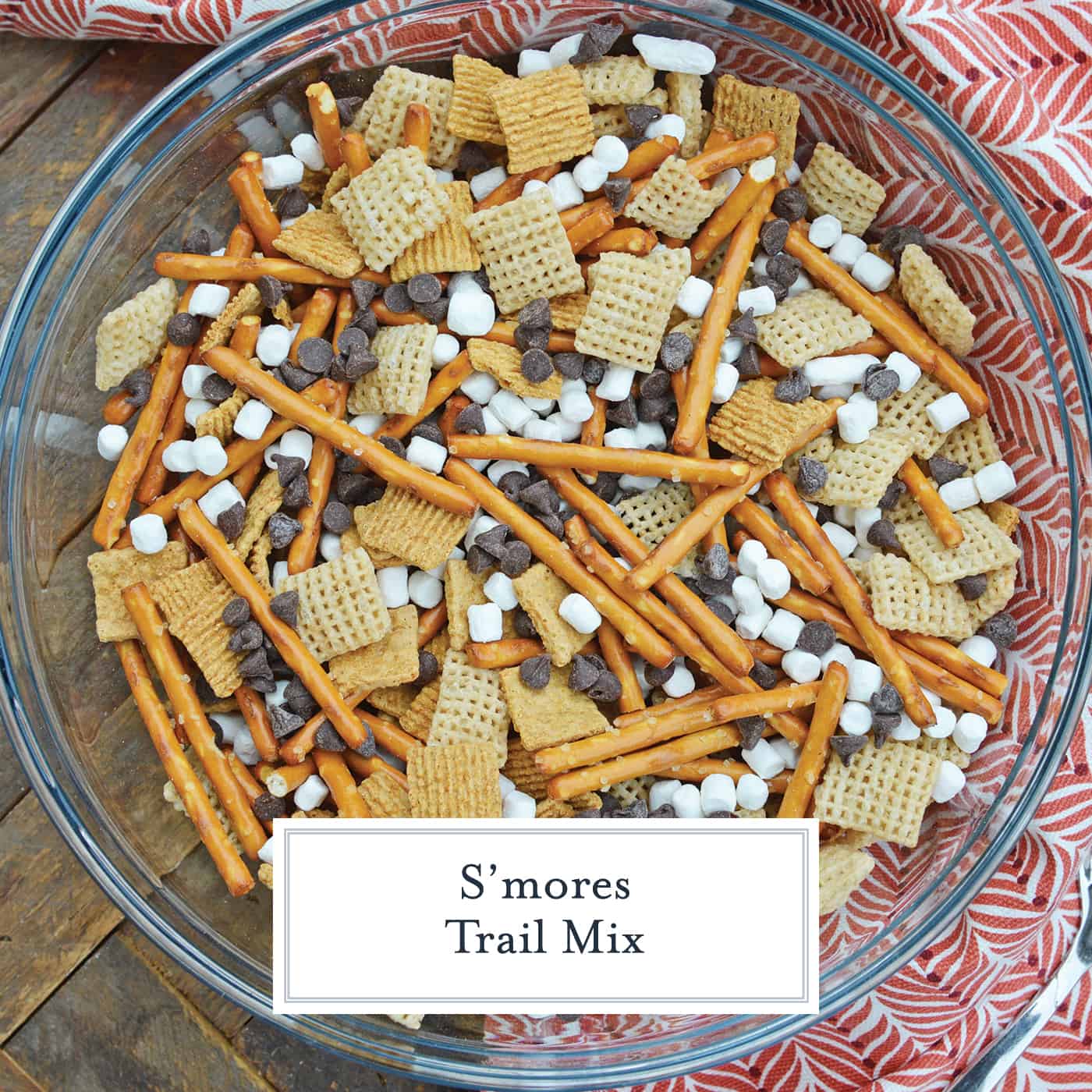 S'mores Trail Mix uses just 5 ingredient to make a sweet, salty and crunchy snack that is perfect for on-the-go and anytime of day! #trailmixrecipes #smoresrecipes www.savoryexperiments.com