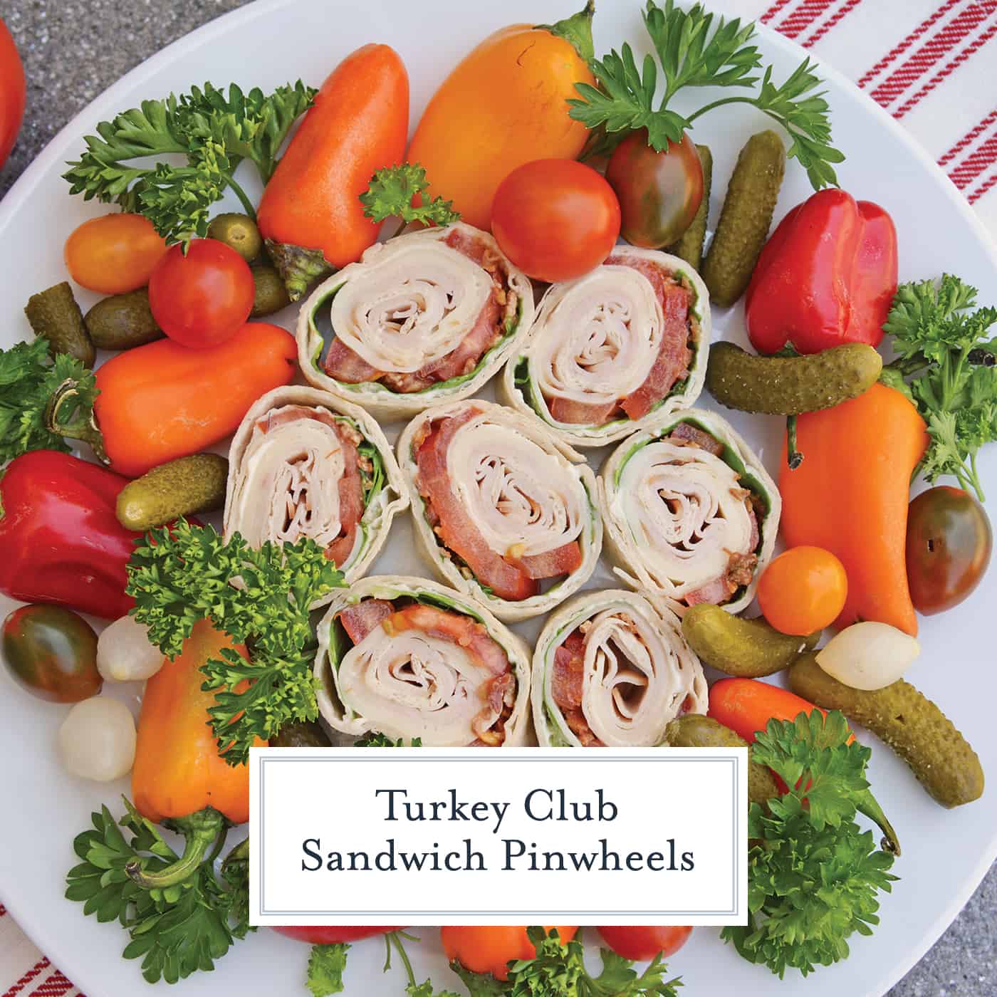 Turkey Club Sandwich Pinwheels use the traditional club sandwich ingredients, but wrap them in a tortilla. Easy to make, eat and clean up! #clubsandwichrecipe #turkeyclub #howtomakepinwheels www.savoryexperiments.com