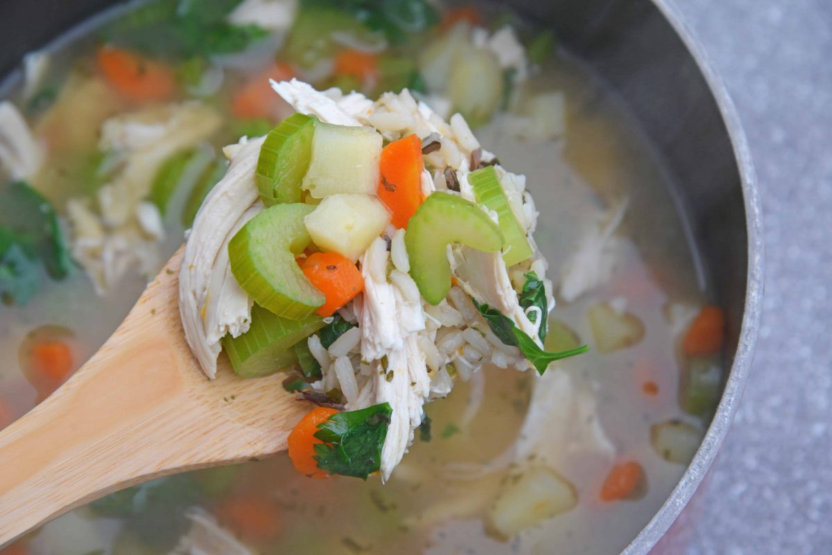 This 20-Minute Wild Rice Chicken Soup is an incredibly easy but flavorful 20 minute meal made with two kitchen hacks that will make your life so much easier! It'll become a winter soup staple in your home! #chickensoup #chickenwildricesoup www.savoryexperiments.com