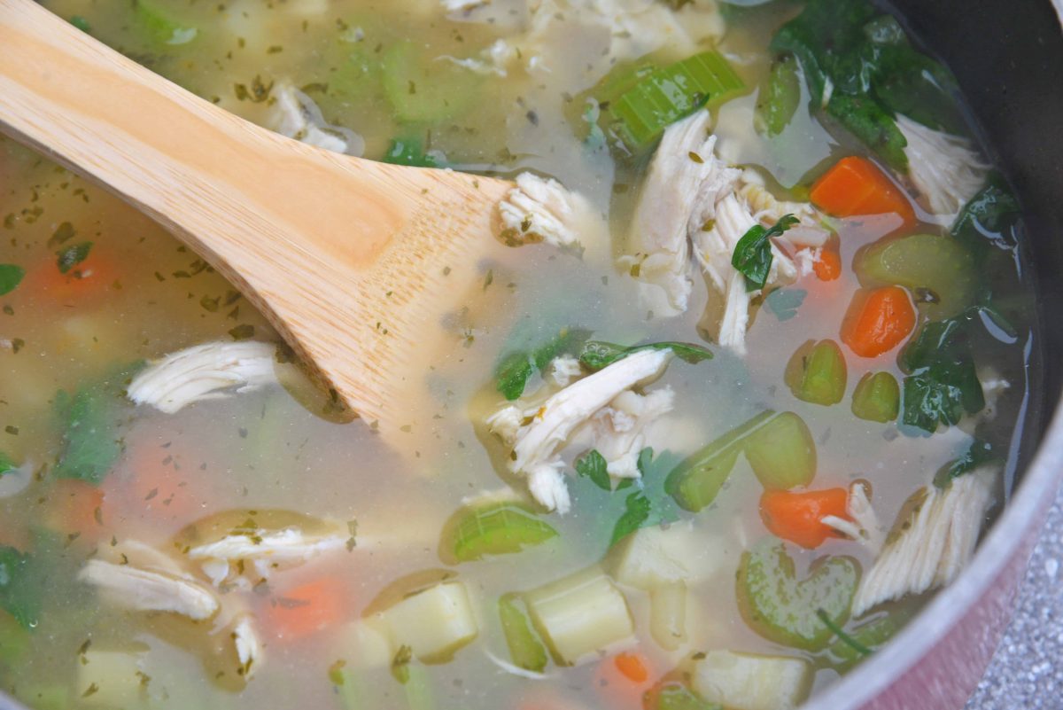 This 20-Minute Wild Rice Chicken Soup is an incredibly easy but flavorful 20 minute meal made with two kitchen hacks that will make your life so much easier! It'll become a winter soup staple in your home! #chickensoup #chickenwildricesoup www.savoryexperiments.com