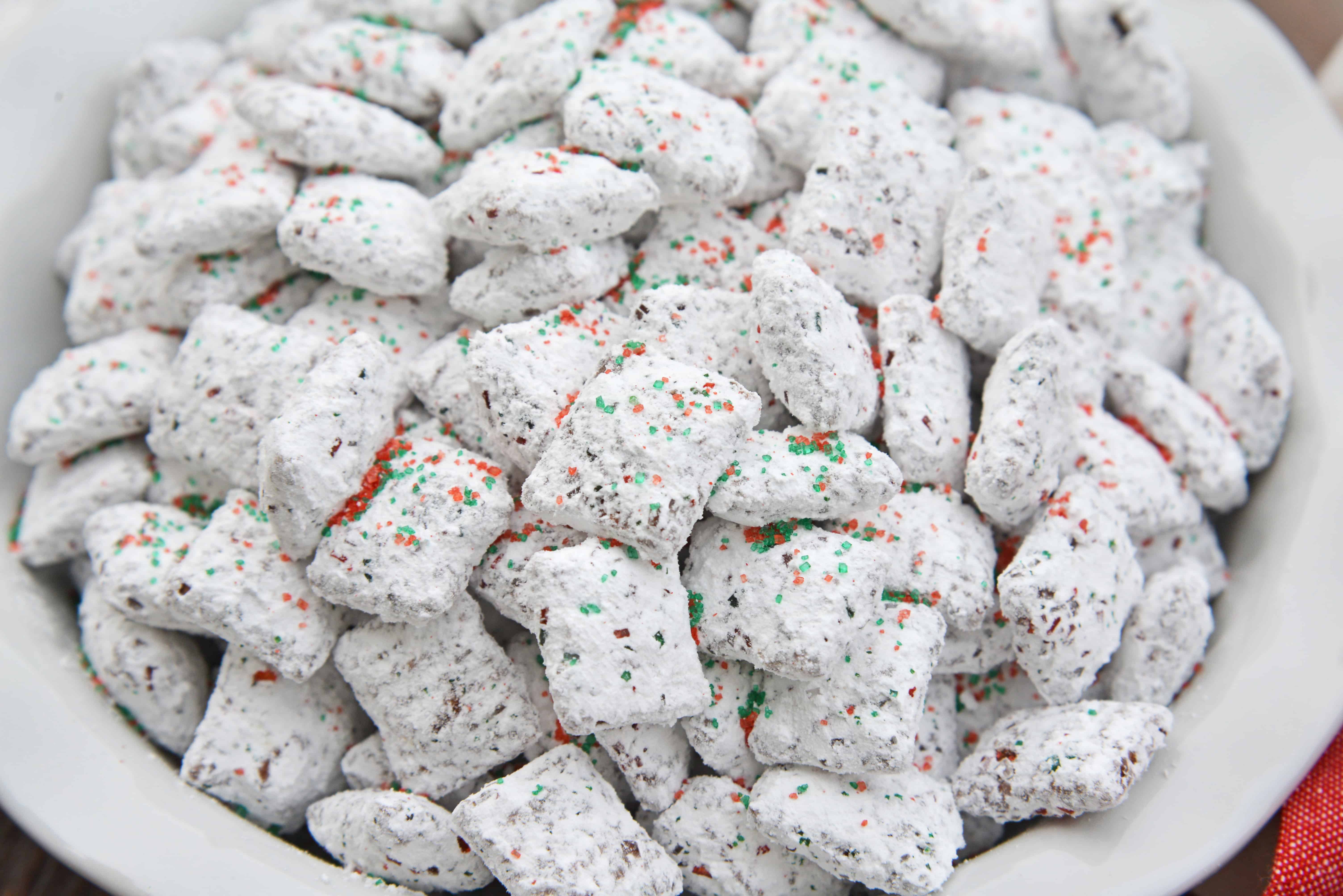 Christmas Puppy Chow transforms a traditional muddy buddy recipe into a festive Reindeer Chow mix! The perfect no-bake dessert for any party or event. #puppychow #reindeerchow #muddybuddy www.savoryexperiments.com