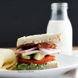 Turkey BLT on a white plate - leftover turkey recipes