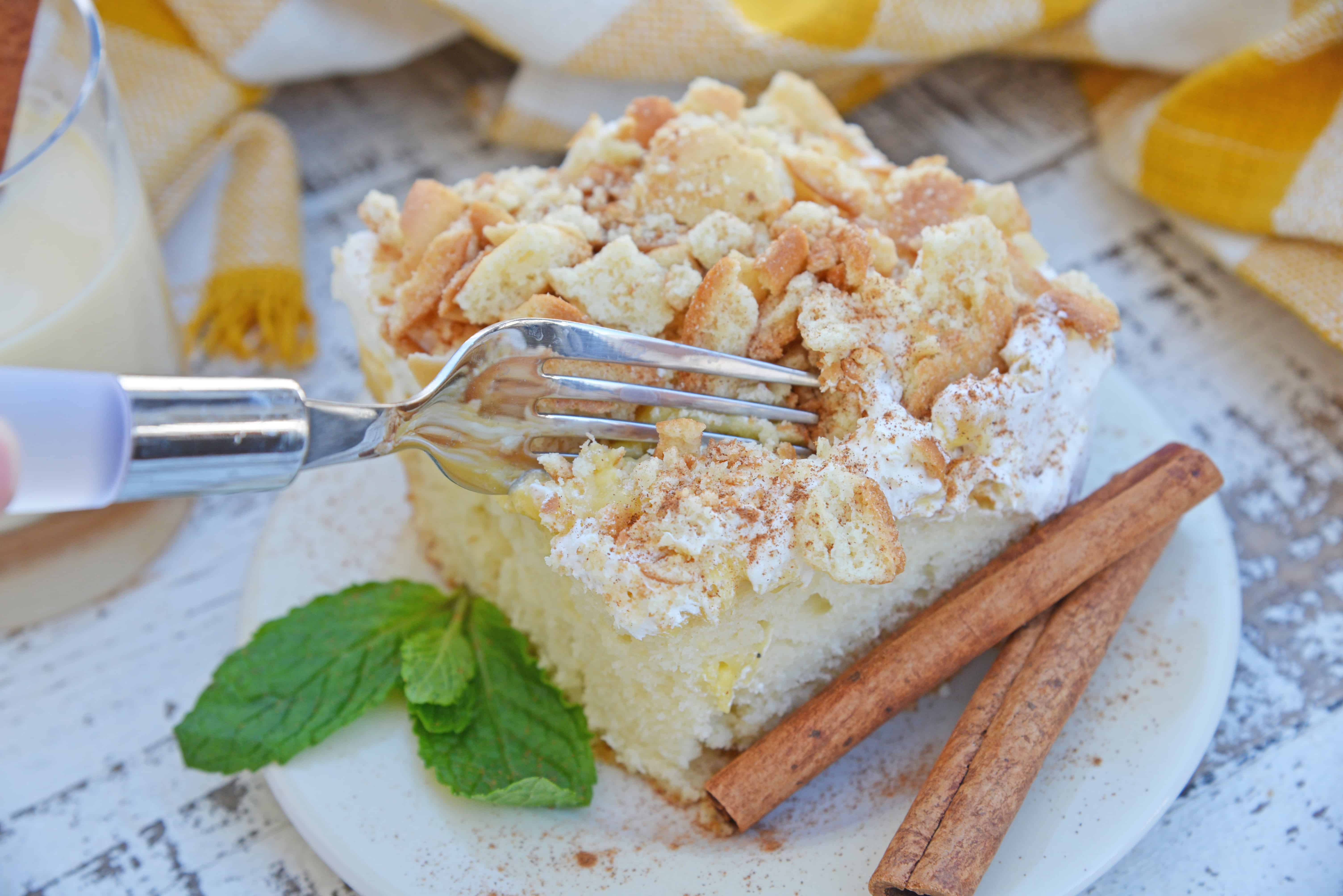 This Eggnog Poke Cake recipe is an easy pudding poke cake made with box cake mix and instant vanilla pudding, with delicious eggnog flavor. #pokecakerecipe #puddingpokecake #eggnogrecipes www.savoryexperiments.com