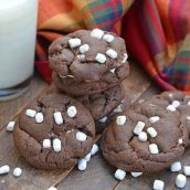 Hot Chocolate Cookies are must-make Christmas cookies! A favorite chocolate sugar cookie recipe with marshmallows, you'll never be able to eat just one! #hotchocolatecookies #chocolatesugarcookiesrecipe #christmascookies www.savoryexperiments.com