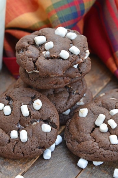 Hot Chocolate Cookies are must-make Christmas cookies! A favorite chocolate sugar cookie recipe with marshmallows, you'll never be able to eat just one! #hotchocolatecookies #chocolatesugarcookiesrecipe #christmascookies www.savoryexperiments.com