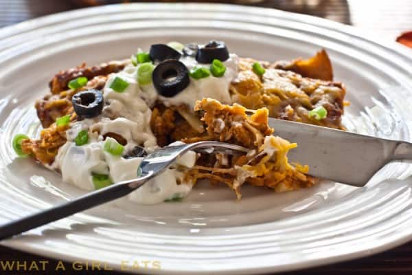 Turkey enchiladas on a white plate - leftover turkey recipes