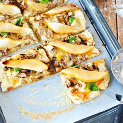 Turkey pear pizza cut into squares - leftover turkey recipes